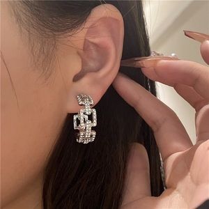 Geometric hollow diamond gold and silver plated C-shape half circle earrings.